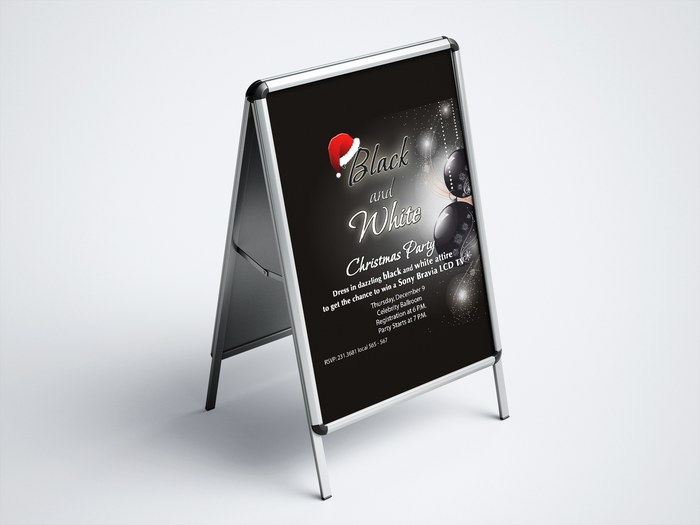Winter event advertising on a sidewalk sign